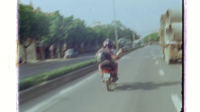 Video Reference: Tire, Sky, Wheel, Vehicle, Automotive lighting, Asphalt, Motor vehicle, Tree, Automotive mirror, Motorcycle