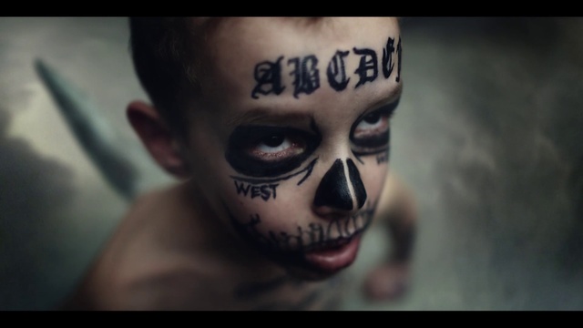 Video Reference: Head, Eye, Eyelash, Human, Flash photography, Jaw, Headgear, Tattoo, Darkness, Fictional character