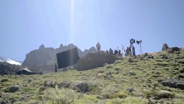 Video Reference: Sky, Bedrock, Plant, Terrain, Formation, Mountain, Outcrop, Landscape, Mountain range, Geological phenomenon