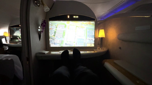 Video Reference: Air travel, Display device, Gadget, Recreation, Room, Multimedia, Airline, Darkness, Machine, Circle