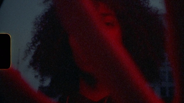 Video Reference: Sky, Textile, Automotive lighting, Orange, Grey, Paint, Art, Petal, Font, Material property