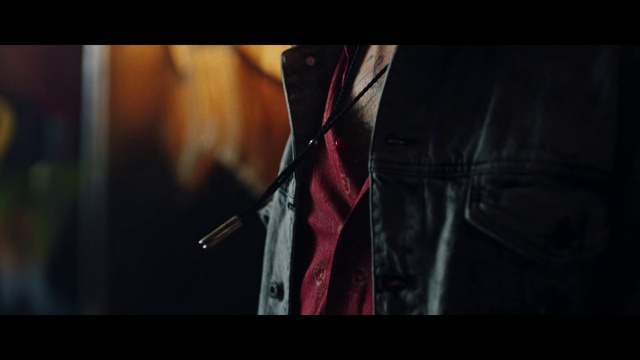 Video Reference: Flash photography, Sleeve, Leather jacket, Font, Entertainment, Human leg, Wrist, Elbow, Event, Electric blue