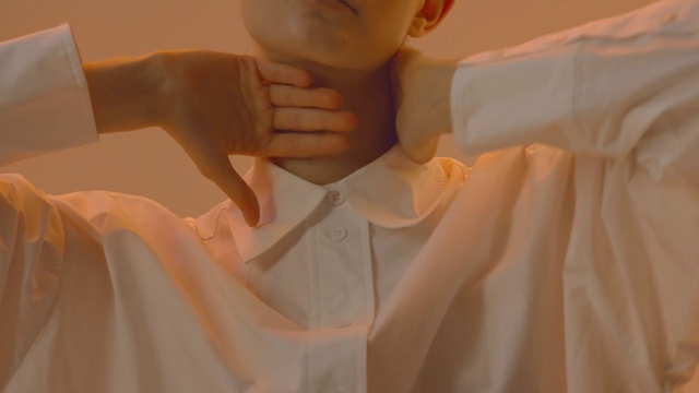 Video Reference: Skin, Neck, Sleeve, Orange, Ear, Eyelash, Gesture, Finger, Thumb, Comfort