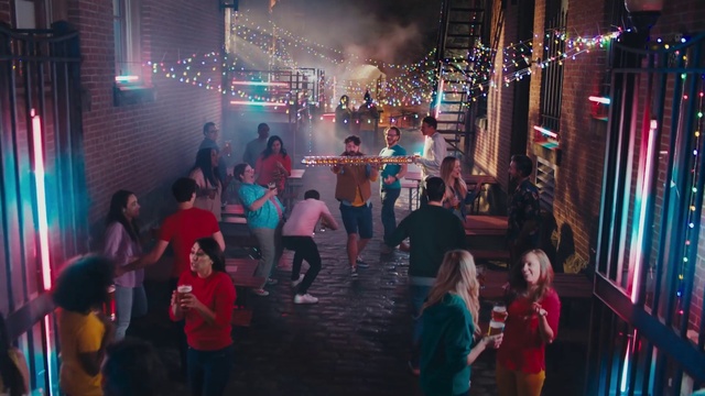 Video Reference: Clothing, Light, Purple, Entertainment, Fashion, Lighting, Plant, Crowd, Social group, Pink