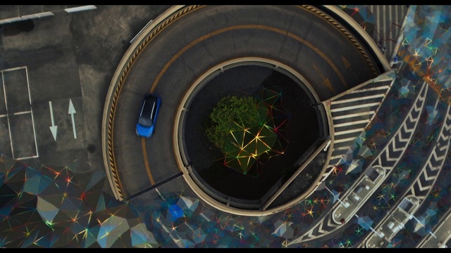 Video Reference: Urban design, Automotive tire, Circle, Landscape, Symmetry, Art, Space, City, Screenshot, Road