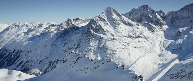 Video Reference: Sky, Snow, Mountain, Slope, Natural landscape, Highland, Ice cap, Terrain, Landscape, Geological phenomenon