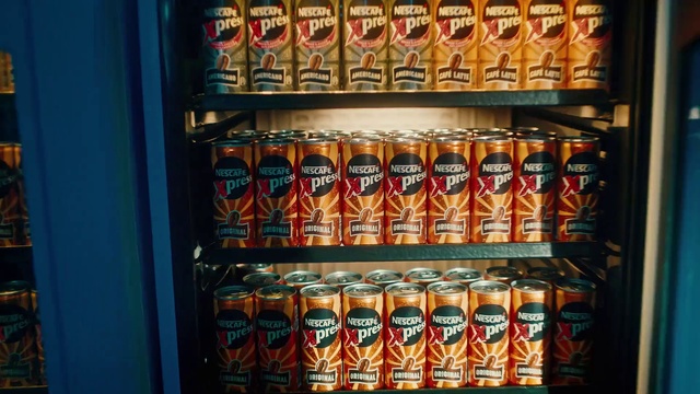 Video Reference: Shelf, Tin can, Aluminum can, Drink, Beverage can, Alcoholic beverage, Canning, Machine, Retail, Shelving