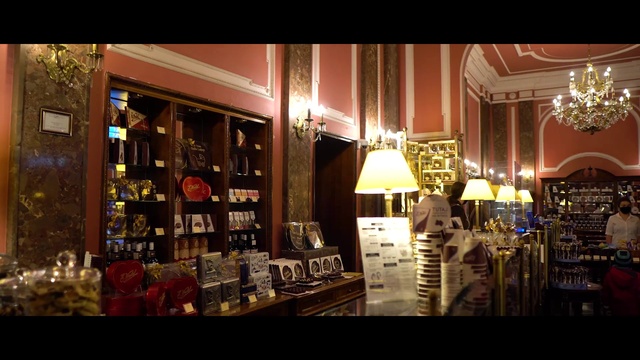 Video Reference: Shelf, Picture frame, Lighting, Interior design, Drinking establishment, Barware, Retail, Market, Shelving, City