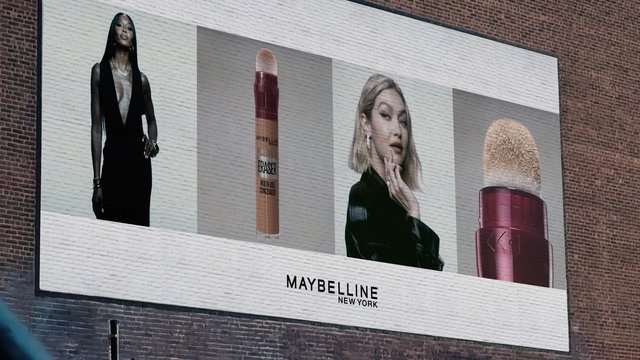 Video Reference: billboard, advertisement, cosmetics, makeup, concealer, Maybelline, outdoor, brick wall, fashion, portrait, beauty, product display, urban, marketing