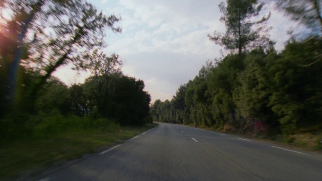 Video Reference: Plant, Cloud, Sky, Road surface, Asphalt, Natural landscape, Tree, Tar, Thoroughfare, Grass