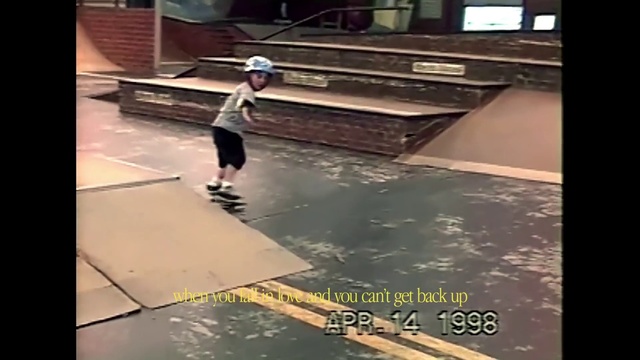 Video Reference: Asphalt, Flooring, Floor, Line, Rectangle, Road surface, Tints and shades, Font, Snapshot, Sidewalk