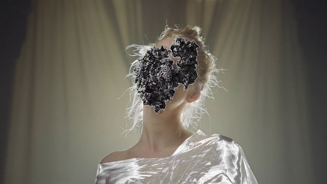 Video Reference: Head, Wedding dress, Shoulder, Bridal veil, Eyelash, Human body, Bride, Flash photography, Neck, Bridal clothing