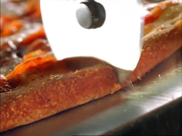 Video Reference: food, close-up, cutting, knife, cooking, kitchen, prepared food, texture, metal surface