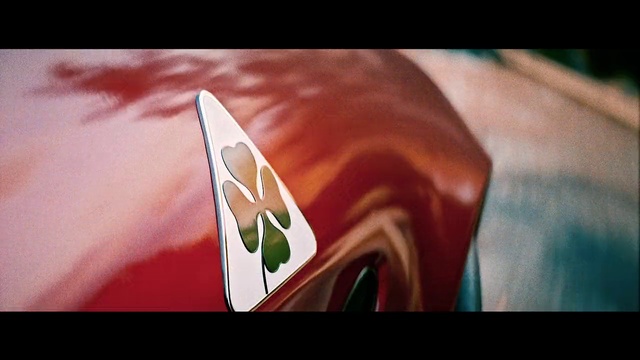 Video Reference: Hood, Automotive lighting, Automotive design, Font, Art, Vehicle door, Eyewear, Electric blue, Logo, Automotive exterior