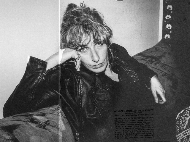Video Reference: Eye, Black, Flash photography, Sleeve, Gesture, Black-and-white, Style, Leather jacket, Jacket, Black hair
