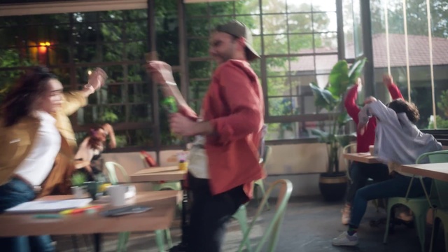 Video Reference: Arm, Furniture, Chair, Plant, Leisure, Entertainment, Event, Fun, Table, T-shirt