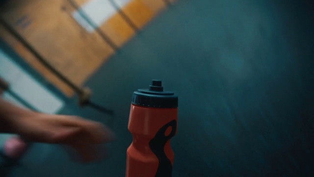 Video Reference: Fluid, Gesture, Finger, Plastic bottle, Gas, Tints and shades, Electric blue, Human leg, Elbow, Wrist