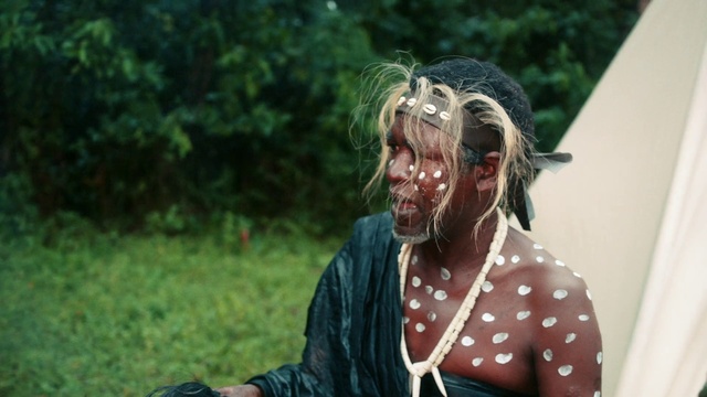 Video Reference: Happy, Plant, Grass, Street fashion, Event, Leisure, Fictional character, Jewellery, Personal protective equipment, Performing arts