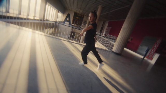Video Reference: Flash photography, Dress, Wood, Floor, Flooring, Thigh, Happy, Sportswear, Human leg, Knee