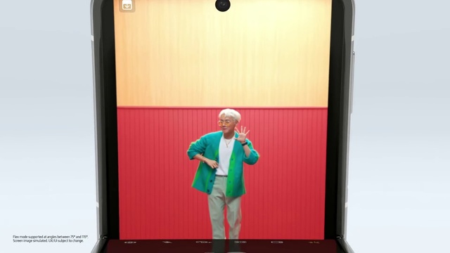 Video Reference: Leg, Coat, Musical instrument, Gesture, Rectangle, Suit, Blazer, Audio equipment, Display device, Electronic device