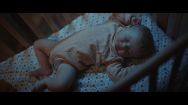 Video Reference: Nose, Cheek, Skin, Arm, Mouth, Comfort, Flash photography, Ear, Iris, Baby