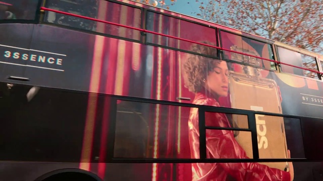 Video Reference: Motor vehicle, Building, Mode of transport, Pink, Tree, Wall, Material property, Automotive design, Magenta, Facade