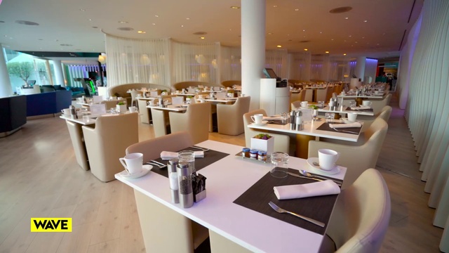 Video Reference: Building, Table, Furniture, Interior design, Chair, Automotive design, Floor, Flooring, Material property, Real estate