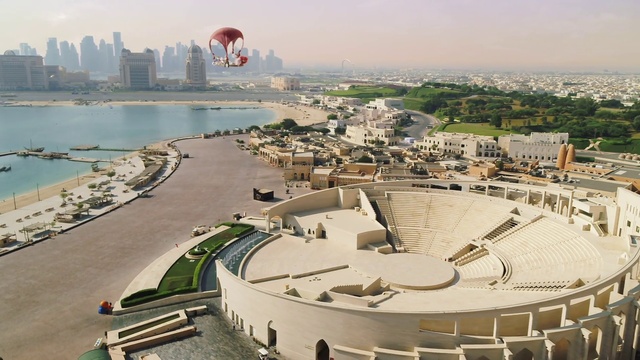 Video Reference: Water, Sky, Daytime, Parachute, Architecture, Urban design, Tree, Landscape, Landmark, City