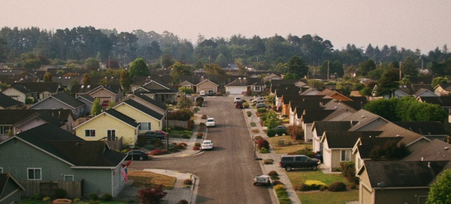 Video Reference: Sky, Plant, Car, Tree, Land lot, Building, Vehicle, Urban design, Thoroughfare, Neighbourhood