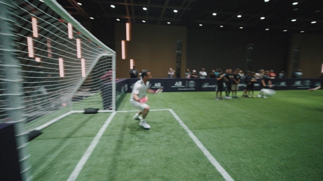 Video Reference: Field house, Sports equipment, Player, Ball game, Soccer, Grass, Flooring, Leisure, Sports, Competition event