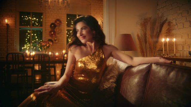 Video Reference: Furniture, Couch, Smile, Flash photography, Dress, Comfort, Candle, Plant, Thigh, Happy