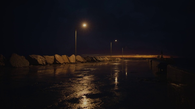 Video Reference: Water, Atmosphere, Street light, Sky, Road surface, Automotive lighting, Horizon, Waterway, Tints and shades, Midnight