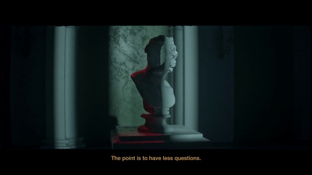 Video Reference: Head, Human body, Statue, Sculpture, Art, Font, Flash photography, Display device, Monument, Fictional character