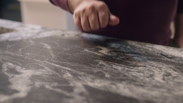 Video Reference: Hand, Table, Wood, Road surface, Grey, Finger, Floor, Flooring, Wood stain, Varnish