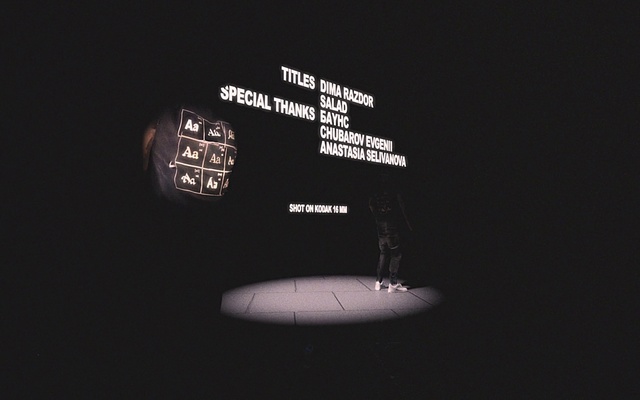 Video Reference: Font, Flash photography, Darkness, Logo, Circle, Graphics, Brand, Display device, Monochrome photography, Art