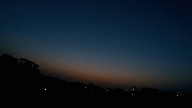 Video Reference: dusk, twilight, cityscape, skyline, evening, sunset, silhouette, urban, horizon, dark, lights, sky, landscape
