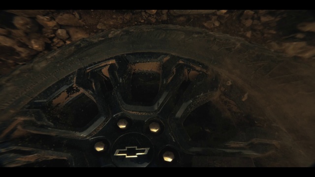 Video Reference: Brown, Automotive tire, Rim, Circle, Space, Art, Darkness, Symmetry, Metal, Pattern
