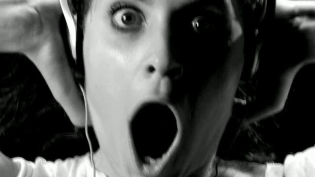 Video Reference: black and white, close-up, surprised, shocked, expression, face, portrait, open mouth, wide eyes, dramatic, emotion, human