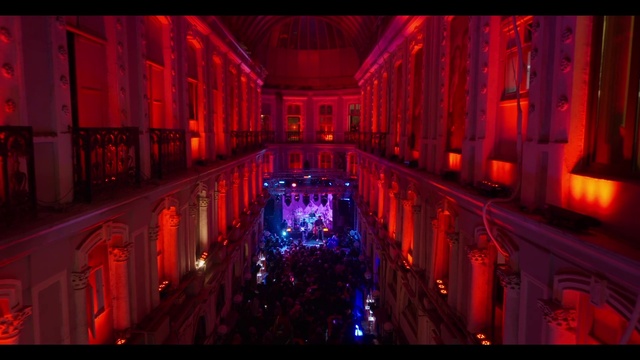 Video Reference: Purple, Entertainment, Red, Magenta, Symmetry, Electric blue, Technology, Event, Stage, Visual effect lighting