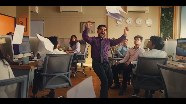 Video Reference: Furniture, Chair, Smile, Table, Houseplant, Happy, Computer monitor, Tie, Event, Job