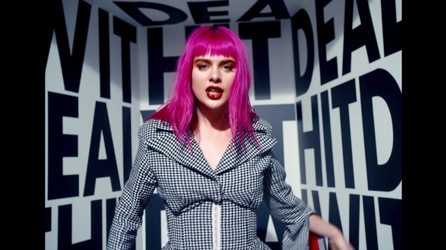 Video Reference: Lip, Lipstick, Eyelash, Purple, Sleeve, Style, Violet, Music artist, Entertainment, Fashion design