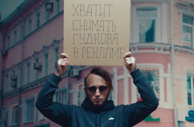 Video Reference: Hand, Window, Standing, Gesture, Goggles, Wall, Font, Landmark, Travel, Eyewear