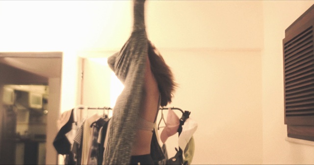 Video Reference: Window, Waist, Feather, Tints and shades, Long hair, Fashion design, Human leg, Fur, Wood, Window treatment