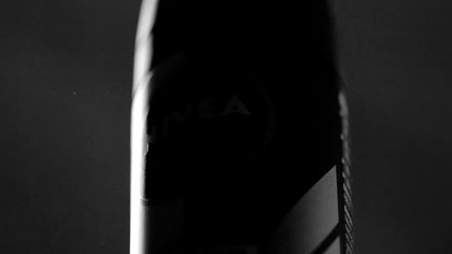 Video Reference: Sleeve, Grey, Tints and shades, Audio equipment, Eyewear, Automotive tire, Flash photography, Font, Electric blue, Darkness