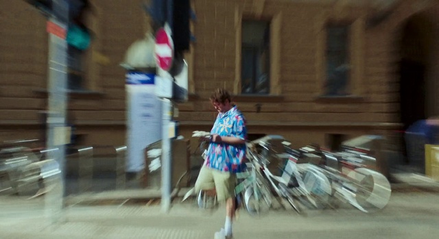 Video Reference: Shorts, Window, Road, Asphalt, Sidewalk, City, Event, Electric blue, Road surface, Human leg