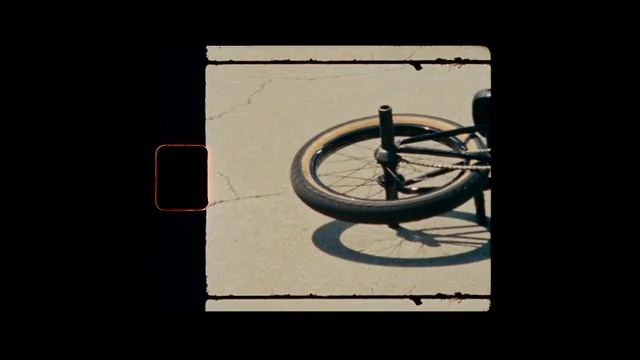 Video Reference: Bicycle, Bicycle tire, Bicycle wheel rim, Tire, Bicycle wheel, Wheel, Automotive tire, Street light, Bicycle fork, Bicycle accessory