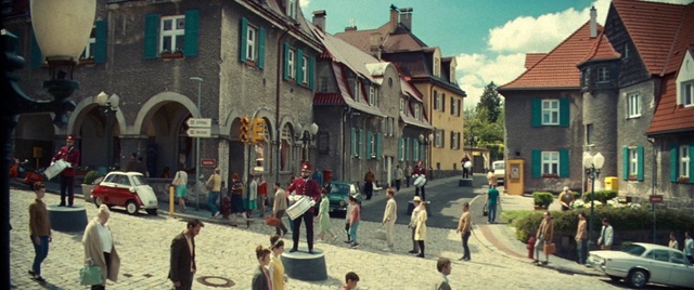 Video Reference: Clothing, Building, Sky, Window, Cloud, Plant, House, Neighbourhood, Travel, Urban design