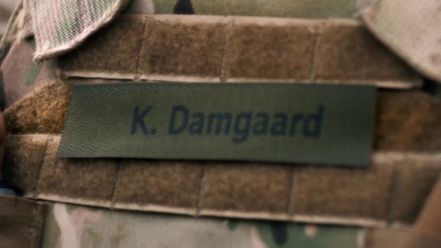 Video Reference: Font, Rectangle, Grass, Wall, Wood, Commemorative plaque, Brick, Design, Pattern, Number