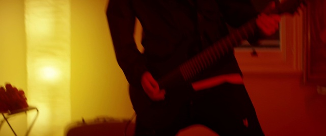 Video Reference: Musical instrument, Guitar, String instrument, String instrument, Musician, Guitar accessory, Plucked string instruments, Guitarist, Orange, String instrument accessory