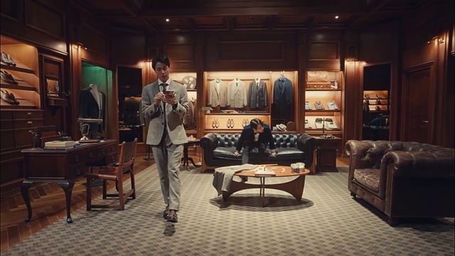 Video Reference: Couch, Furniture, Table, Building, Picture frame, studio couch, Coffee table, Flooring, Wood, Event